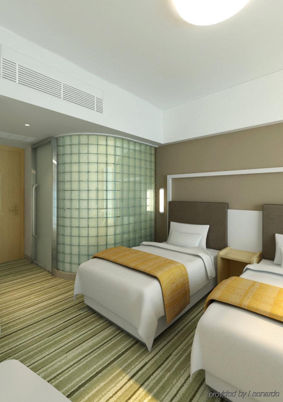 Holiday Inn Express Shanghai Nanhuizui Habitación foto